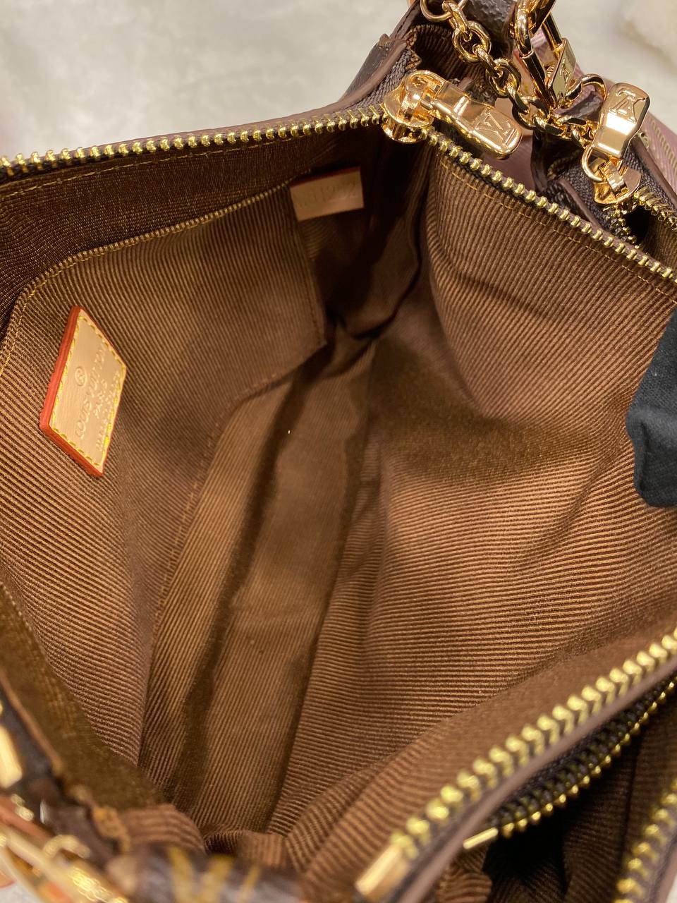 LV Multi Pochette