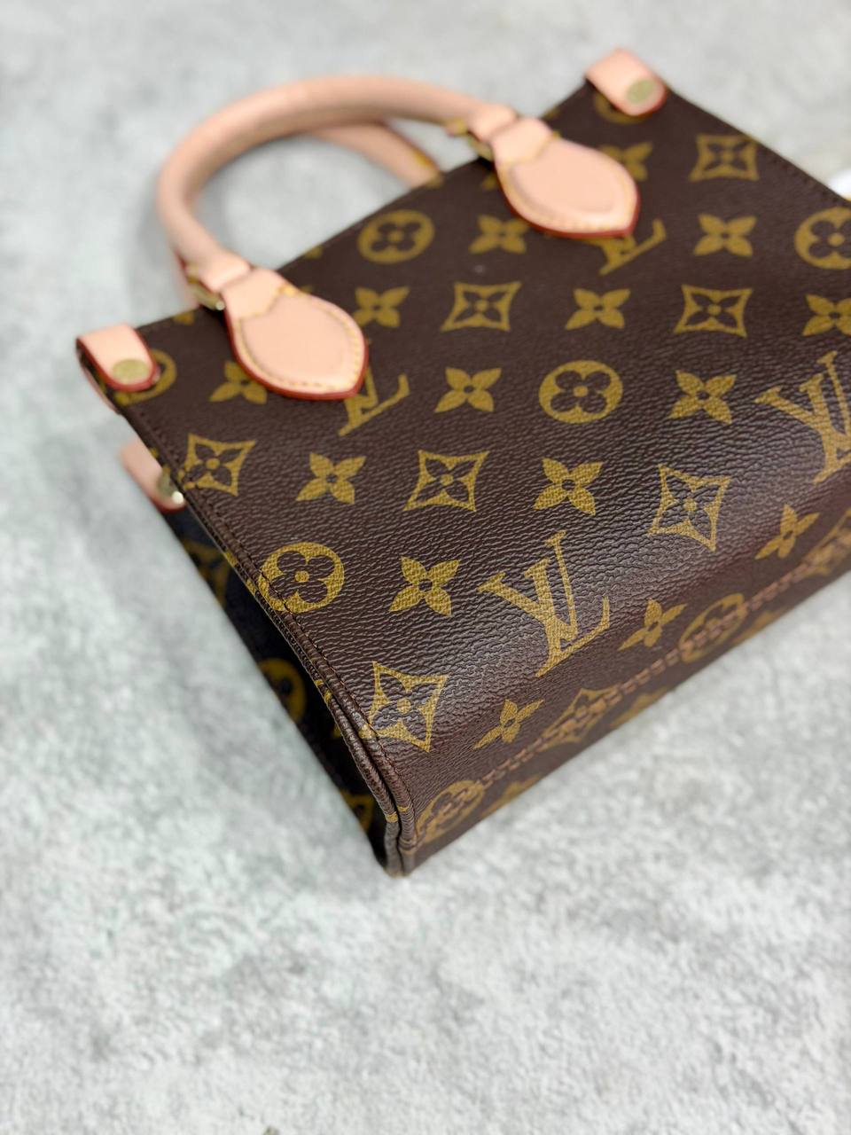 LV Onth£go Mini